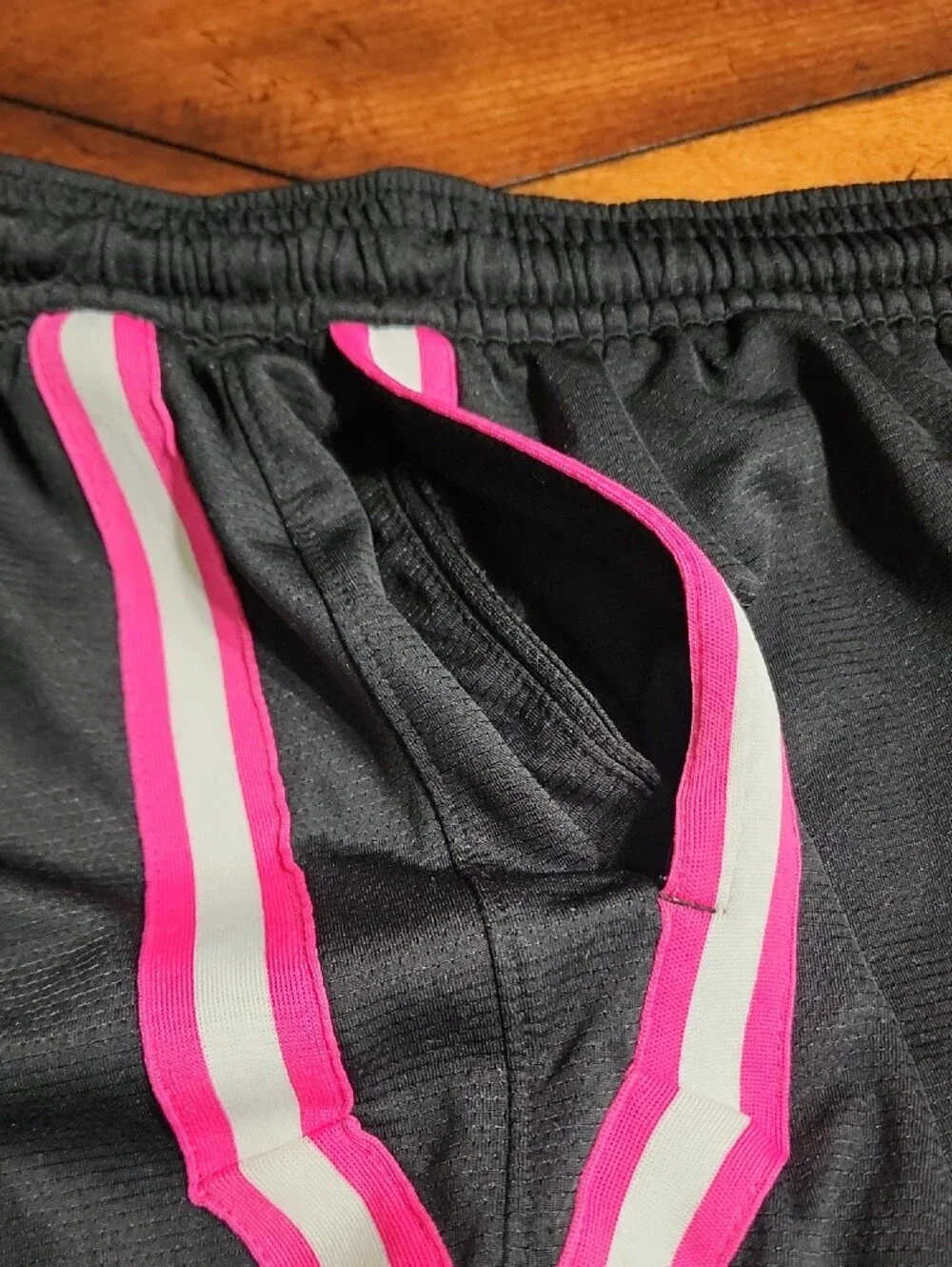 L Nike Women’s Black Athletic Shorts with Pink Trim